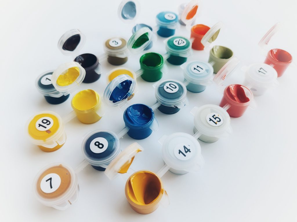 numbered paint pots in different colors